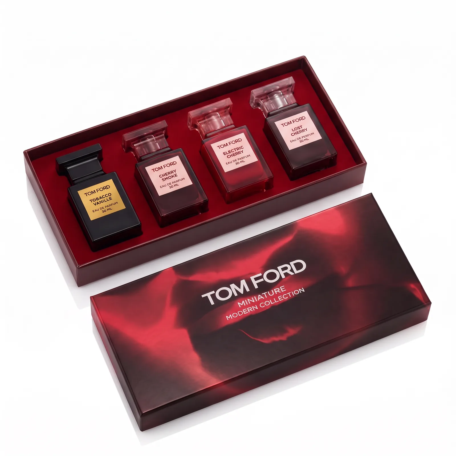 Zestaw Tom Ford — otwarte pudełko z czterema flakonami 30 ml i wieczkiem